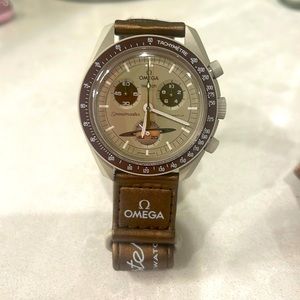 Swatch. Mission to Saturn Watch. Tan and brown